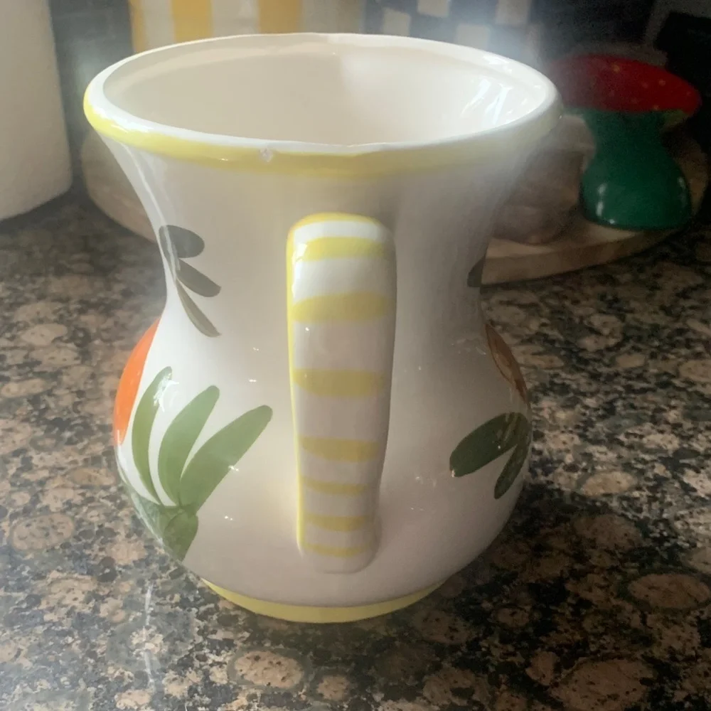 Vintage Handcrafted Ceramic Pitcher with Floral Design